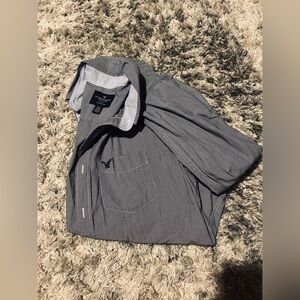 grey american eagle short sleeve button up 
size small